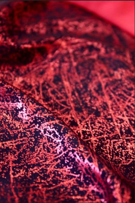 Купальник для спортивной гимнастики GK Elite 4142 без рукавов красно-оранжевый с черным рисунком